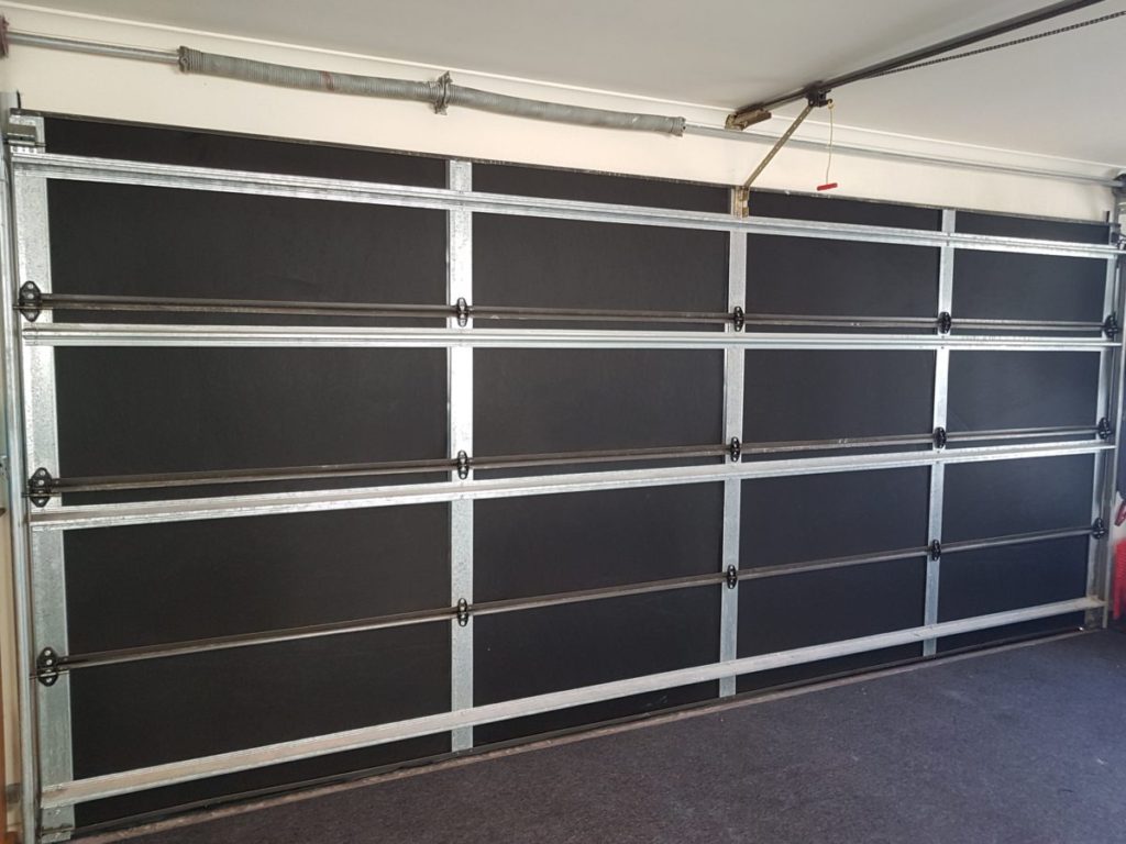 Garage door with insulation