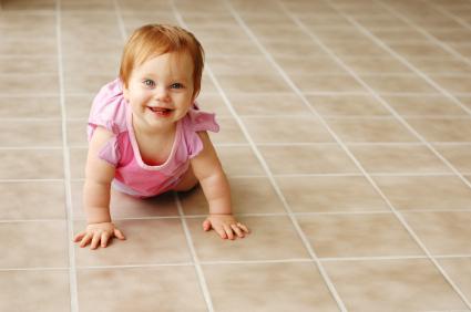 Baby on tiled floor