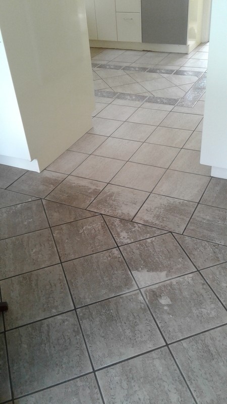Discoloured tiles before
