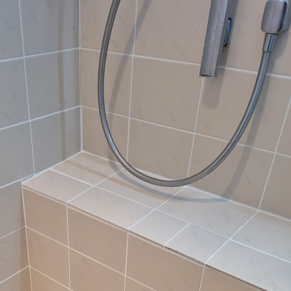 Cracked tile in shower after