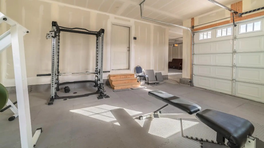 Home gym set up in a garage